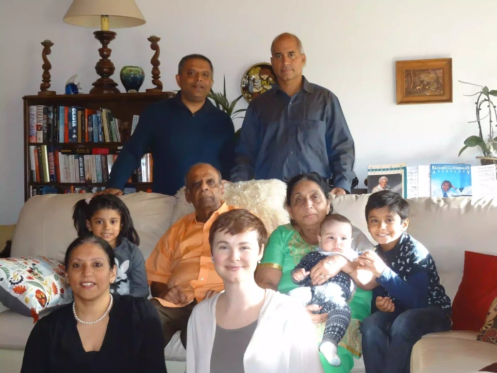 Geku george with his parents, sister, wife, and their children